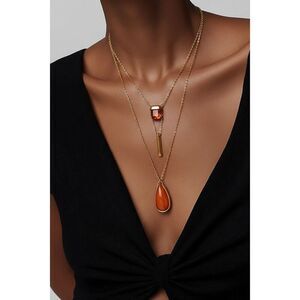 Triple strand, gold and orange stone necklace